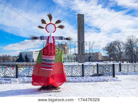 ORYOL, RUSSIA - FEBRUARY 26, 2017: Straw effigy called Maslenitsa is attribute of Russian Carnival, that represents evil is burned at the end of the day