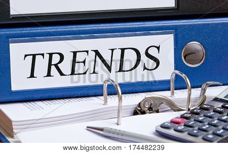 Trends - blue binder on desk in the office