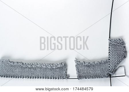 Knitted sweaters with knitting needles and wool hendmade