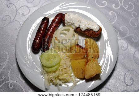 Beautifully decorated with the white plate of homemade dishes. Kara