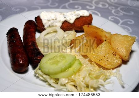 Beautifully decorated with the white plate of homemade dishes. Kara
