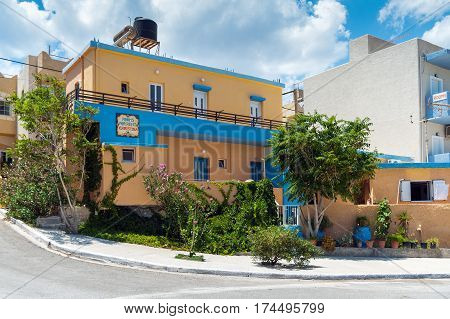 PALEOCHORA, CRETE, GREECE - JUNE 2016: Traditional Greek house near the road at Paleochora town on Crete island, Greece