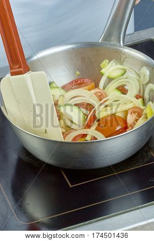 chef salad mixing bowl in a series full of food recipes Food being prepared and cooked in a contemporary kitchen, with and without the chef