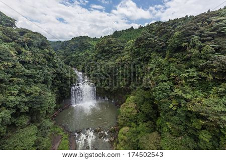 Kamikawa Otaki Waterfall And Green Forest In Kagoshima, Kyushu, Japan