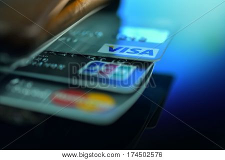 Bangkok Thailand - February 25 2017:Three Creadit Card (Visa JCB Mastercard) in a wallet.