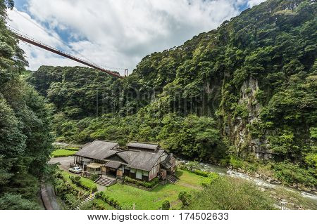 Beautiful Valley And Japanese House In Kamikawa Otaki Waterfall Park, Kagoshima, Kyushu, Japan