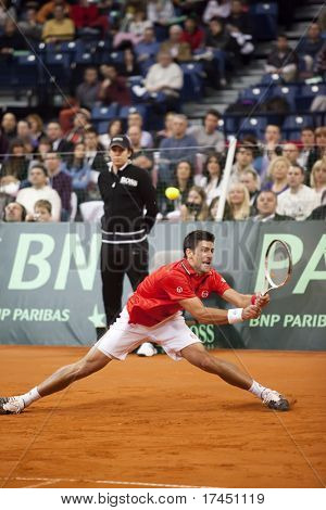 BELGRADE, SERBIA - MARCH 7: Novak Djokovic plays against John Isner in the Davis Cup 2010 on March 7, 2010 in Belgrade, Serbia.
