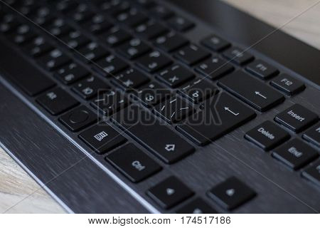 Computer black keyboard isolated on grey background