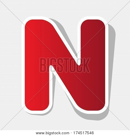 Letter N sign design template element. Vector. New year reddish icon with outside stroke and gray shadow on light gray background.