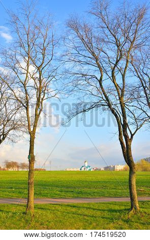 Park in Kupchino at spring sunny day Russia.