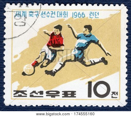 KOREA - CIRCA 1966: Postage stamp printed in Korea with a picture of a football players, with the inscription 