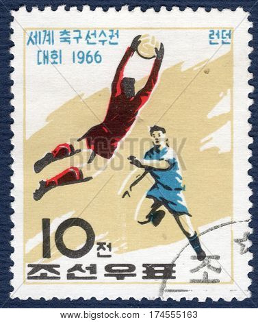 KOREA - CIRCA 1966: Postage stamp printed in Korea with a picture of a football players, with the inscription 