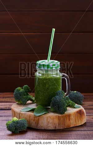 Green smoothie with broccoli, spinach and apple juice