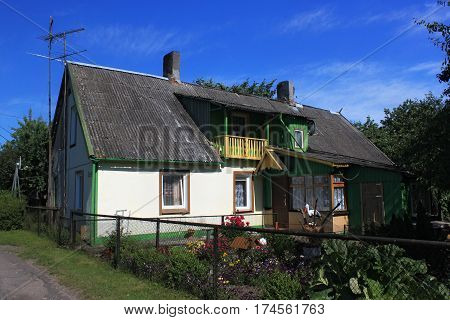 Old former german building in the Morskoe (Pillkoppen) village in the Curonian Spit National Park. Russia.