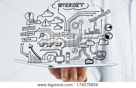 Businessman hand demostrating business strategy plan on tablet screen