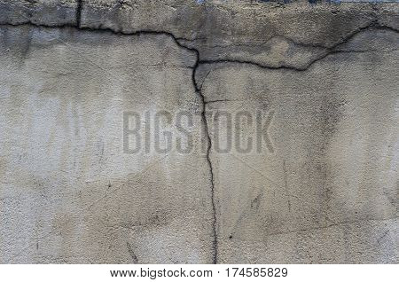 Damaged cracked old wall.