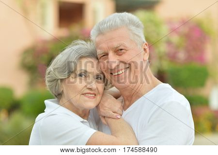 Portrait of a happy elderly couple embracing