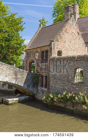 Famous medieval St Bonifacius Bridge in historic center of Bruges.(Belgium). Vertically.