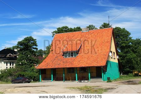 Old former german building in the Morskoe (Pillkoppen) village in the Curonian Spit National Park. Russia.