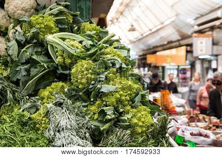 Organic beautiful green vegetables at farmers market. Roman cauliflowers or Romanesco broccoli.