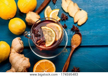 Cup Of Ginger Tea With Lemon And Honey On Dark Blue Background,