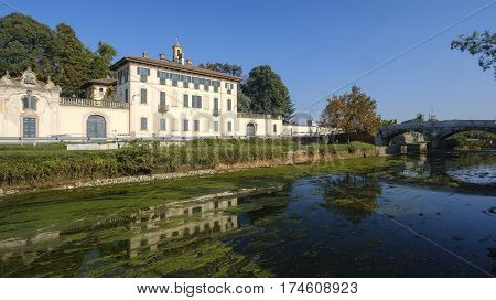 Cassinetta di Lugagnano (Milan Lombardy Italy): facade of the historic Villa Visconti Maineri along the canal known as Naviglio Grande of Turbigo