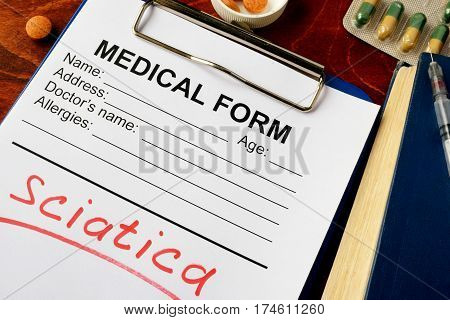 Diagnosis sciatica written in a medical form.