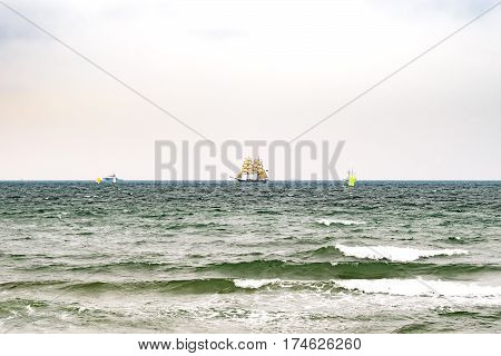 Sailing ship on the sea. Tall Ship.Yachting and Sailing travel. Cruises and holidays. Postcard and Book cover