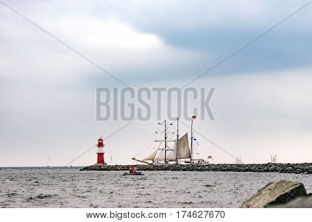 Sailing ship on the sea. Tall Ship.Yachting and Sailing travel. Cruises and holidays. Postcard and Book cover.