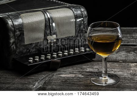 Old Accordion With Wine
