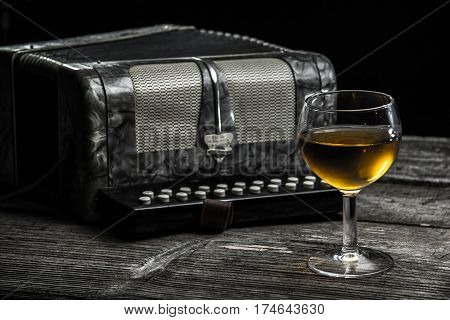 Old Accordion With Wine