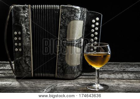 Old Accordion With Wine