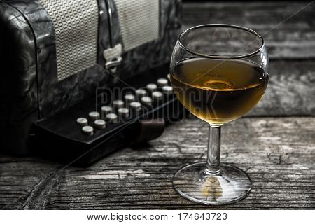 Old Accordion With Wine