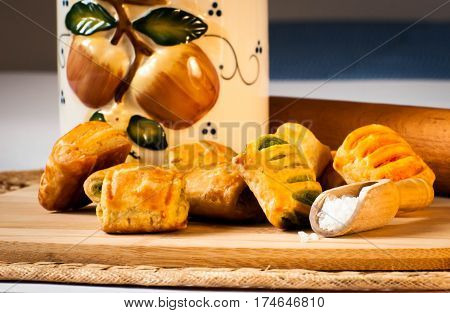 salty snack displayed with a decorated jar and a wooden spoon of salt