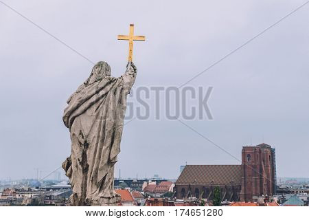 Wroclaw, Silesia, Poland - September, 18th, 2016. Wroclaw skyline and St. Mary Magdalene church high view and the statue on the top of Wroclaw university building housing the Aula Leopoldina room.