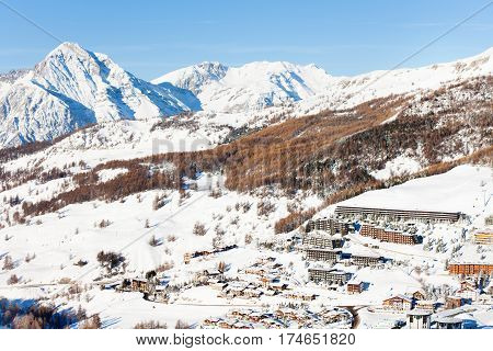 View over the snow-clad slopes of Sestriere village - famous ski resort in Piedmont
