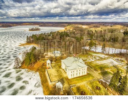 Trakai, Lithuania: Aerial UAV top view of Uzutrakis Palace in the winter
