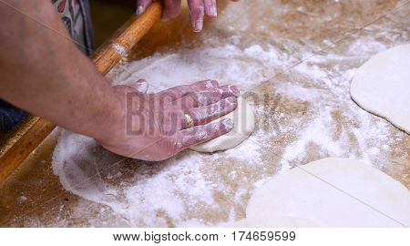 Preparing Dough For Pie On A Sofra