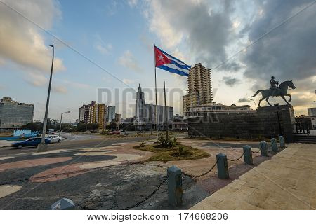 A Cuban flag in the middle of the square in Havana.
