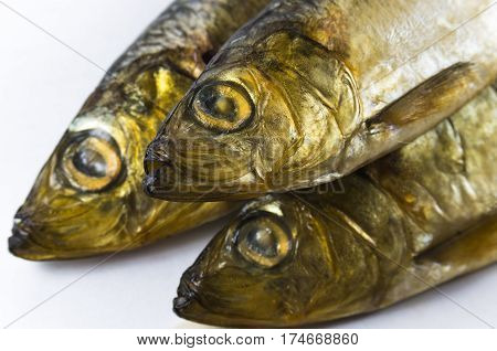 Baltic herring, smoked on a white background