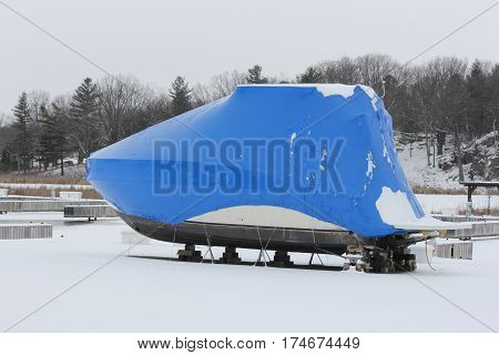 Shrink wrap on boats, on dry land during the winter season as protection against elements.