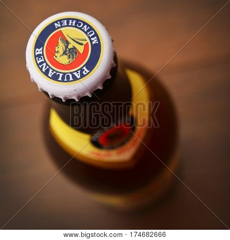 Caransebes Romania - February 6: close-up of a paulaner beer bottle cap. shot taken on february 6th 2016