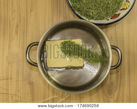 Medical Marijuana Leafs Butter Cooking With Water