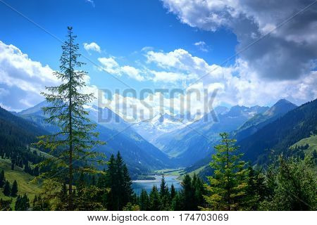 Amazing summer morning on the fantastic Speicher Durlassboden lake. Alps, Austria, Europe.