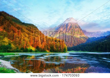 Amazing summer morning on the fantastic Swiss lake Obersee, located near Nafels village. Alps, Switzerland, Europe.