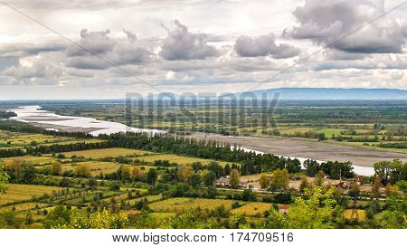 Panorama floodplain Rioni river with dramatic clouds