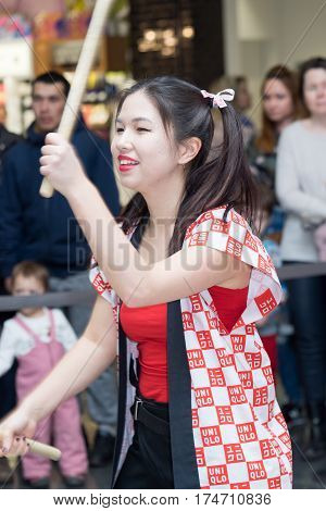 Moscow, Russia - March 5, 2017: Group Of Japanese Taiko Drummers Girls Perform In 