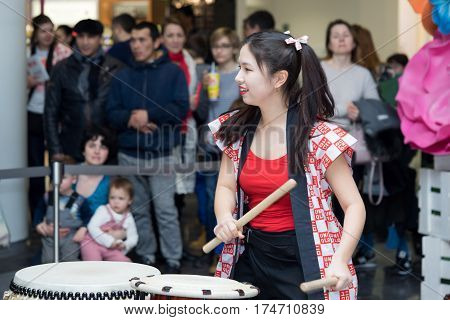 Moscow, Russia - March 5, 2017: Group Of Japanese Taiko Drummers Girls Perform In 