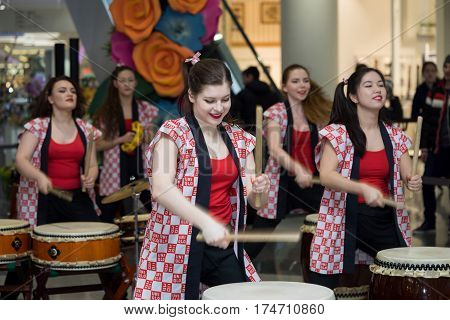 Moscow, Russia - March 5, 2017: Group Of Japanese Taiko Drummers Girls Perform In 