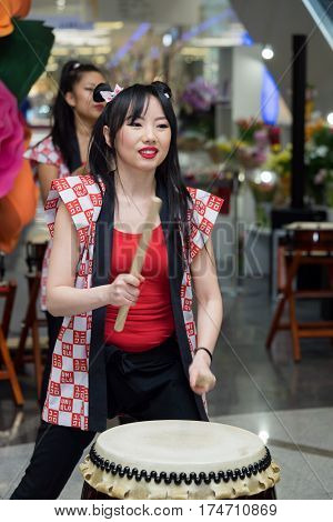 Moscow, Russia - March 5, 2017: Group Of Japanese Taiko Drummers Girls Perform In 